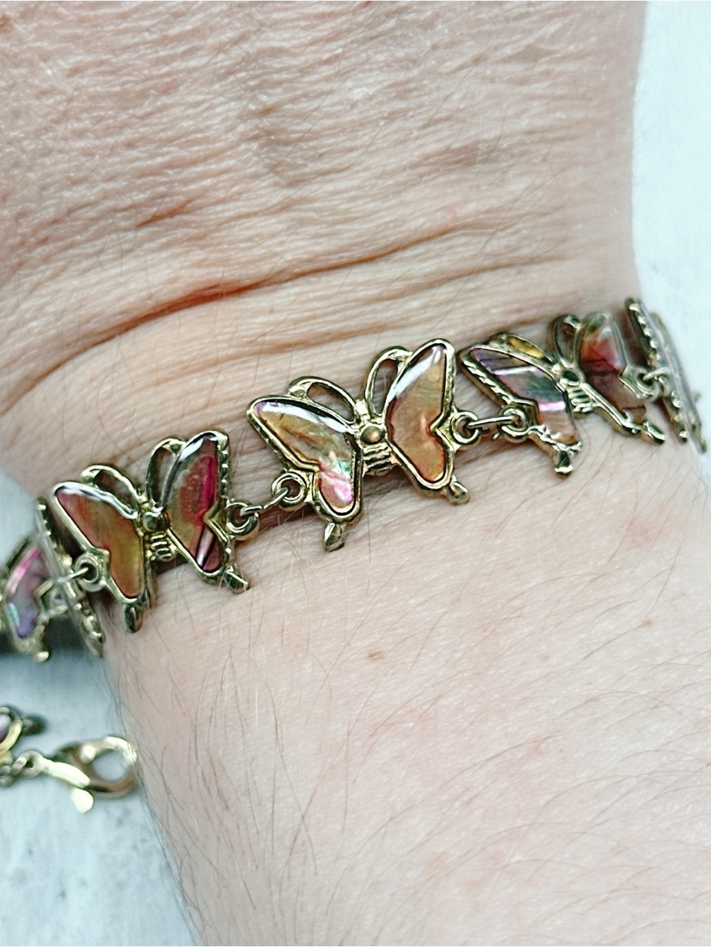 357u. Peach Butterfly Bracelet